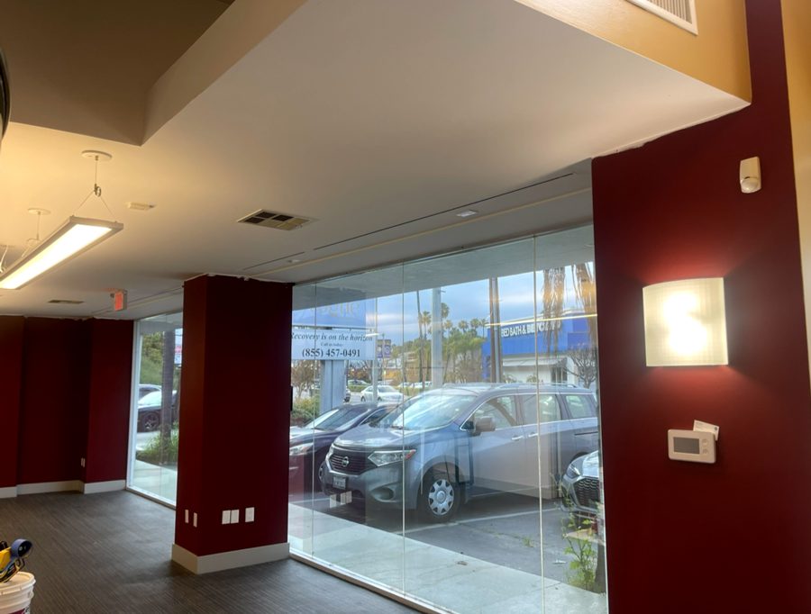 Dealership showroom — window film installation, photo 1